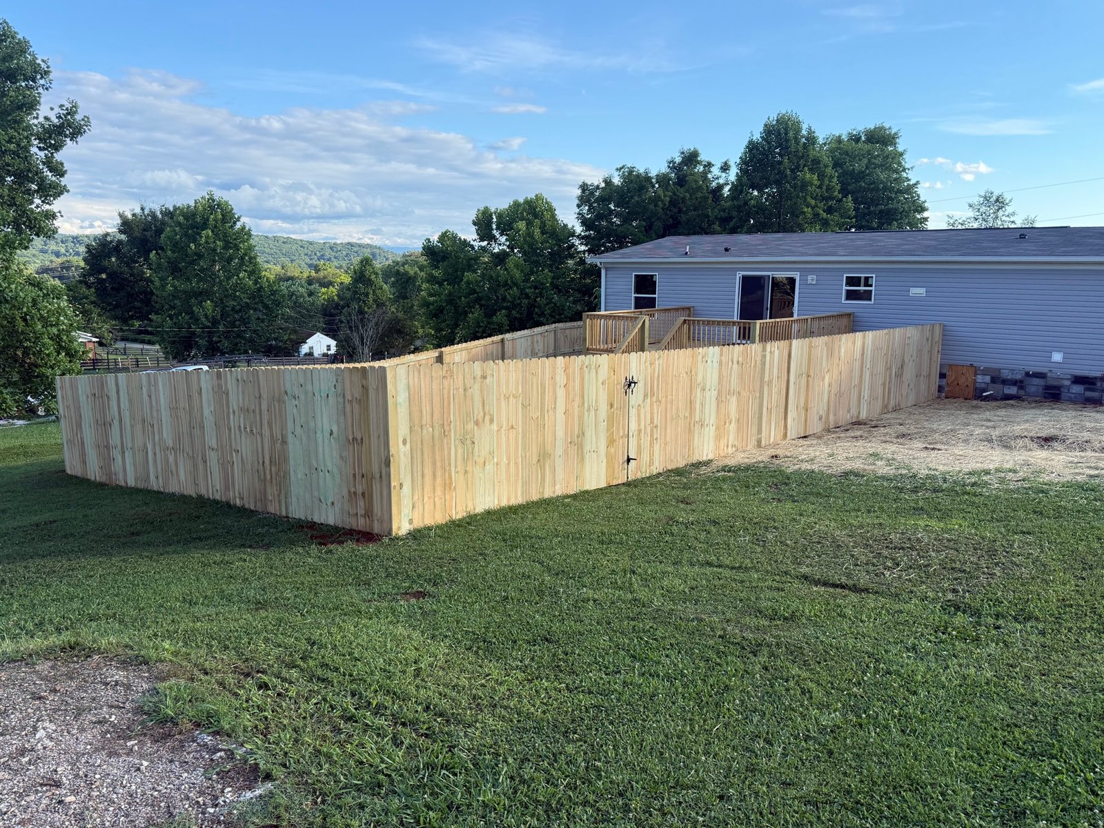 Wood privacy fence installed by JSC Outdoor Solutions